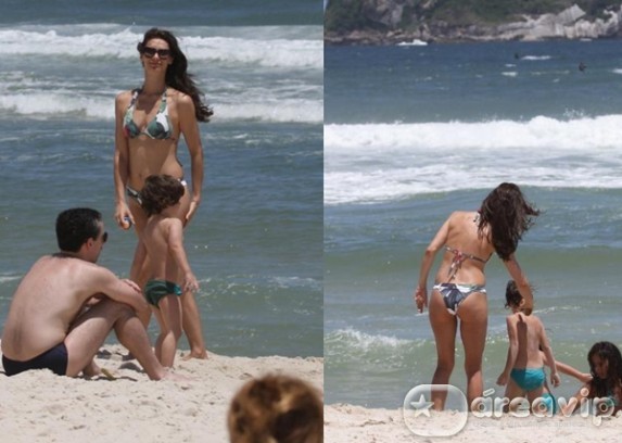 Maria Fernanda Cândido curte praia com a família