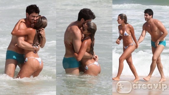 Ex-BBBs Adriana e Rodrigão trocam beijos em praia carioca