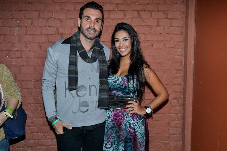 Amanda e o namorado Araújo / Azzi Agency