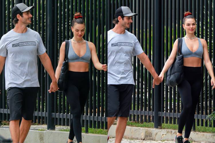 Isis Valverde malha ao lado do marido