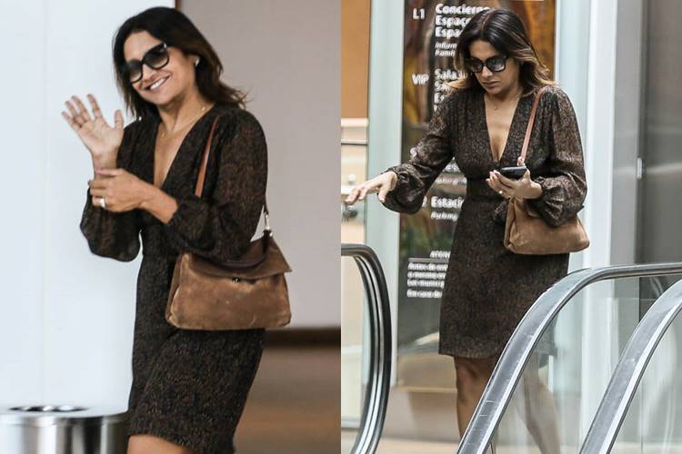 Dira Paes sorri para fotos durante passeio em shopping