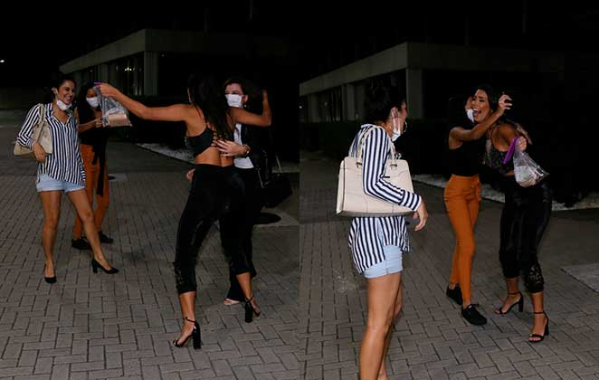Sem máscara, Ivy grita, beija e abraça pessoas na porta do hotel - Anderson Borde/AgNews
