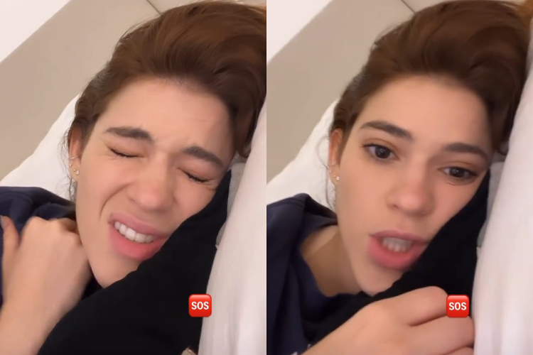 Ana Clara reclamando das dores no pescoço.