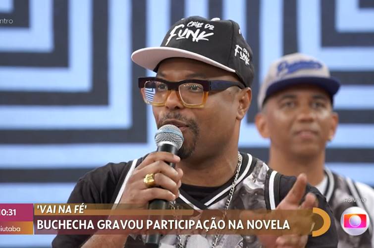 No ‘Encontro’, Buchecha comenta participação em ‘Vai na Fé’: “Perna tremeu”