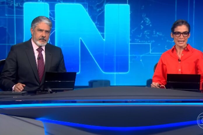 William Bonner e Renata Vasconcellos no Jornal Nacional William Bonner e Renata Vasconcellos no Jornal Nacional
