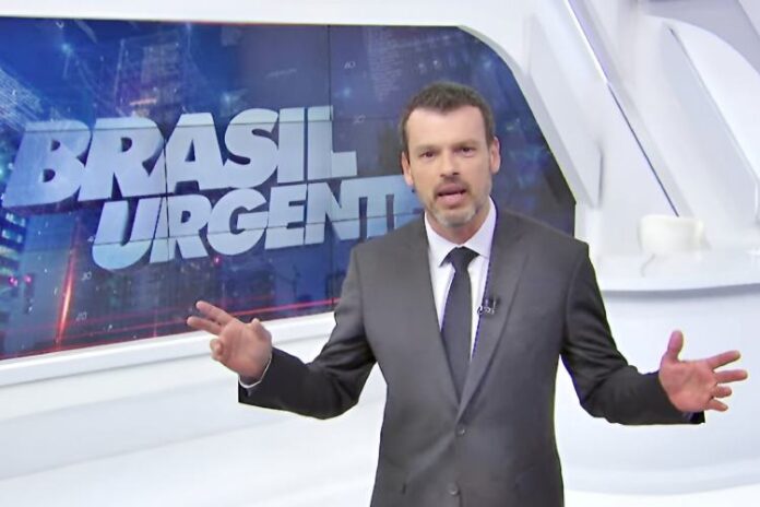Lucas Martins, repórter e apresentador eventual do Brasil Urgente (Reprodução: Band TV)