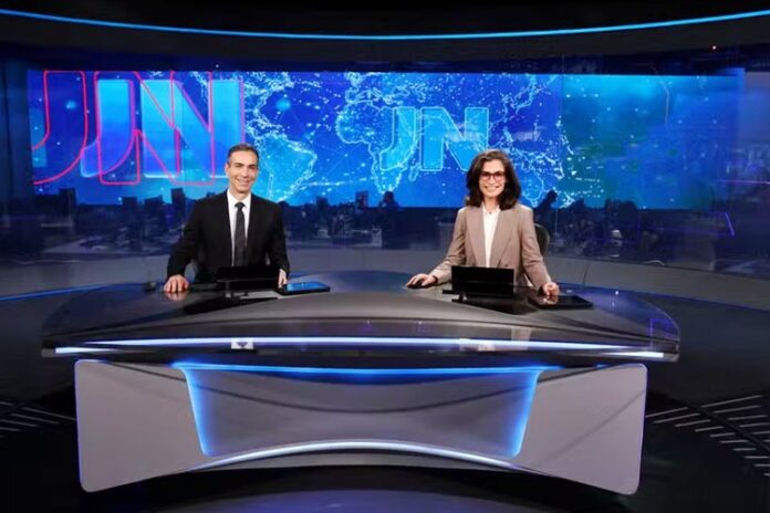 Jornal Nacional com César Tralli e Renata Vasconcellos Jornal Nacional com César Tralli e Renata Vasconcellos - Foto: Globo