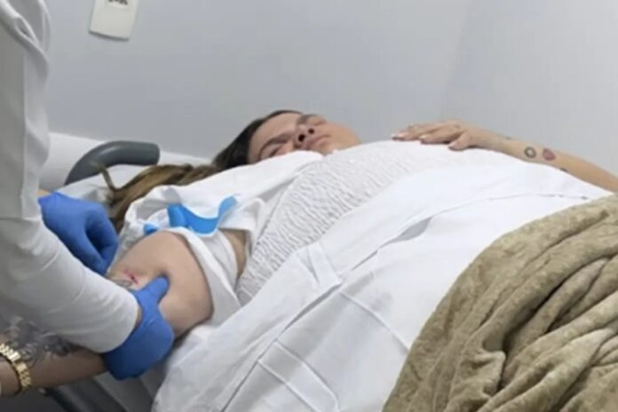 Thais Carla desmaia (Foto: Reprodução)