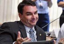Aliados se enfurecem com fuga de Flávio Bolsonaro, após promessa de ficar no Brasil