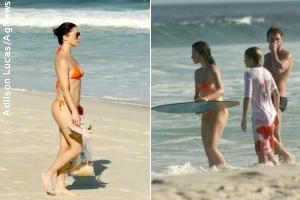 Leticia Spiller brinca na praia com o filho e namorado