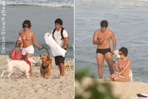 Bruno Gagliasso e Fernanda Paes Leme aproveitam praia com seus cachorros