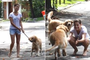 Alinne Moraes passeia com os cachorros e diz estar ótima