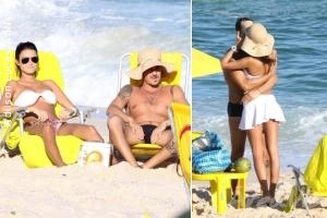 Thaila Ayala e Paulo Vilhena curtem praia carioca aos beijos