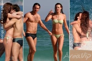 Letícia Birkheuer troca beijos com o novo namorado em praia