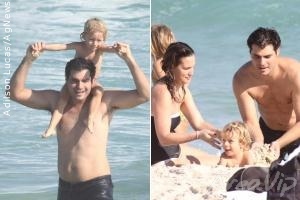 Thiago Lacerda curte a praia com a mulher e o filho