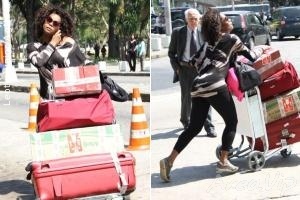 Adriana Bombom é clicada no aeroporto cheia de malas