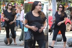 Grávida, Juliana Knust passeia pelo Leblon