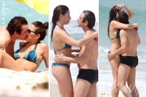 Giselle Itié e Caio Junqueira namoram em praia no Rio