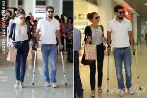 De muletas, Cauã Reymond circula acompanhado de Grazi Massafera em aeroporto