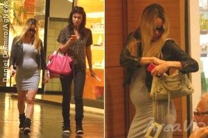 Grávida, Danielle Winits exibe sua barriguinha durante passeio no shopping