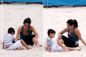 Glória Pires brinca com filho na praia